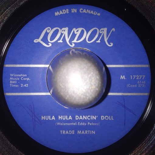 Trade Martin - Something In The Wind / Hula Hula Dancin' Doll (7", Single) (Very Good Plus (VG+))