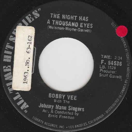 Bobby Vee With The Johnny Mann Singers - The Night Has A Thousand Eyes / Charms (7", Single, RE) (Near Mint (NM or M-))