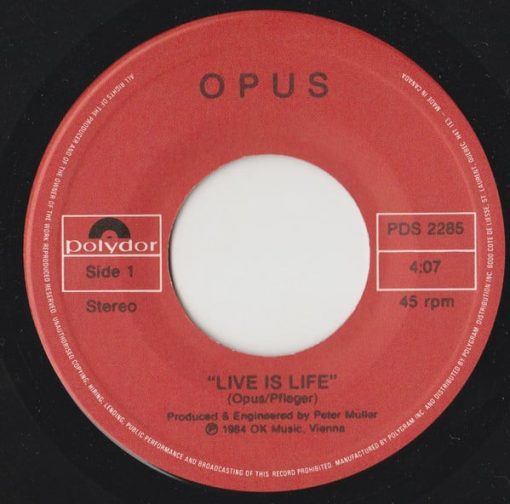 Opus - Live Is Life (7", Single) (Near Mint (NM or M-))