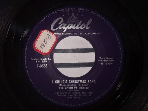 The Andrews Sisters - A Child's Christmas Song / Silver Bells (7") (Very Good Plus (VG+))