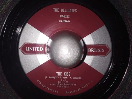 The Delicates (2) - The Kiss / Too Young To Date (7", Single) (Very Good Plus (VG+))