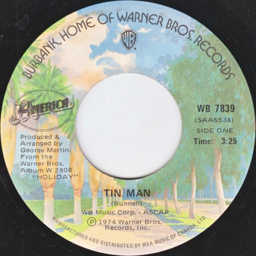 America (2) - Tin Man  (7", Single) (Near Mint (NM or M-))