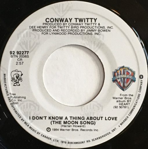 Conway Twitty - I Don't Know A Thing About Love (The Moon Song) / Don't Cry Joni (7", Single) (Near Mint (NM or M-))